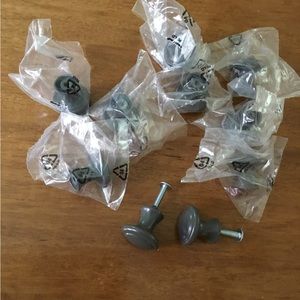 Grey knobs. 1x1”.  Never used. Set of 10.